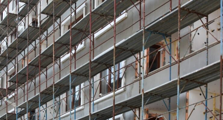 beautiful-shot-metal-steel-bars-glass-windows-building-2-min