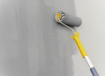 wall-painting-with-roller-concept-min